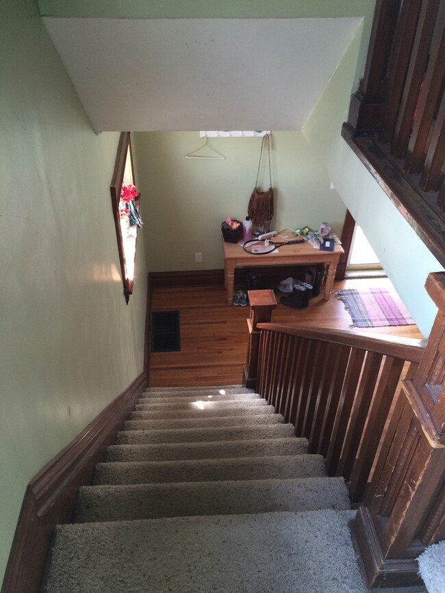 Stairs leading to first floor - 321 W 5th St