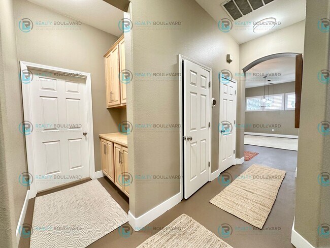 Building Photo - Open Kitchen, Expansive Living, and Covered Patio in Tranquil South Reno Near Trails, Parks & Sho...