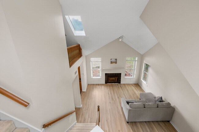 Building Photo - Spacious 3BR Retreat with Soaring Ceilings & Screened Porch