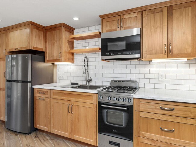 Building Photo - Studio with Loft, Private Patio, and All U...