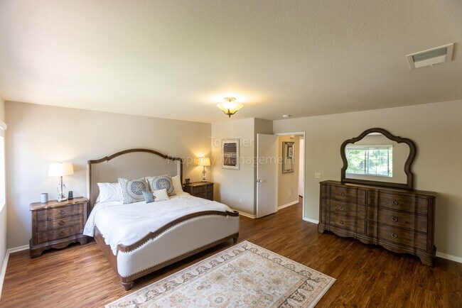 Building Photo - Gorgeous upgraded 4 bed 2.5 bath 2,216 sqft home with Remodeled Kitchen, Hardwood Floors, Tesla S...
