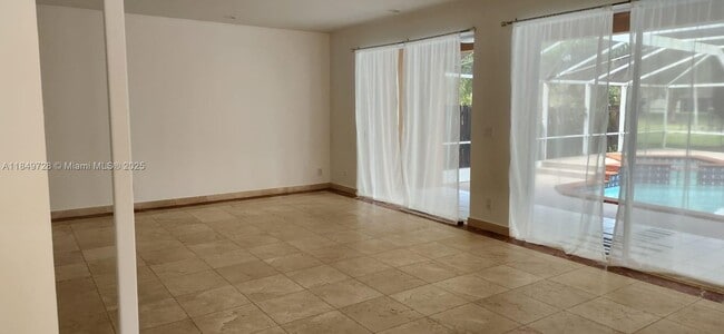 Building Photo - 10850 SW 153rd Ct