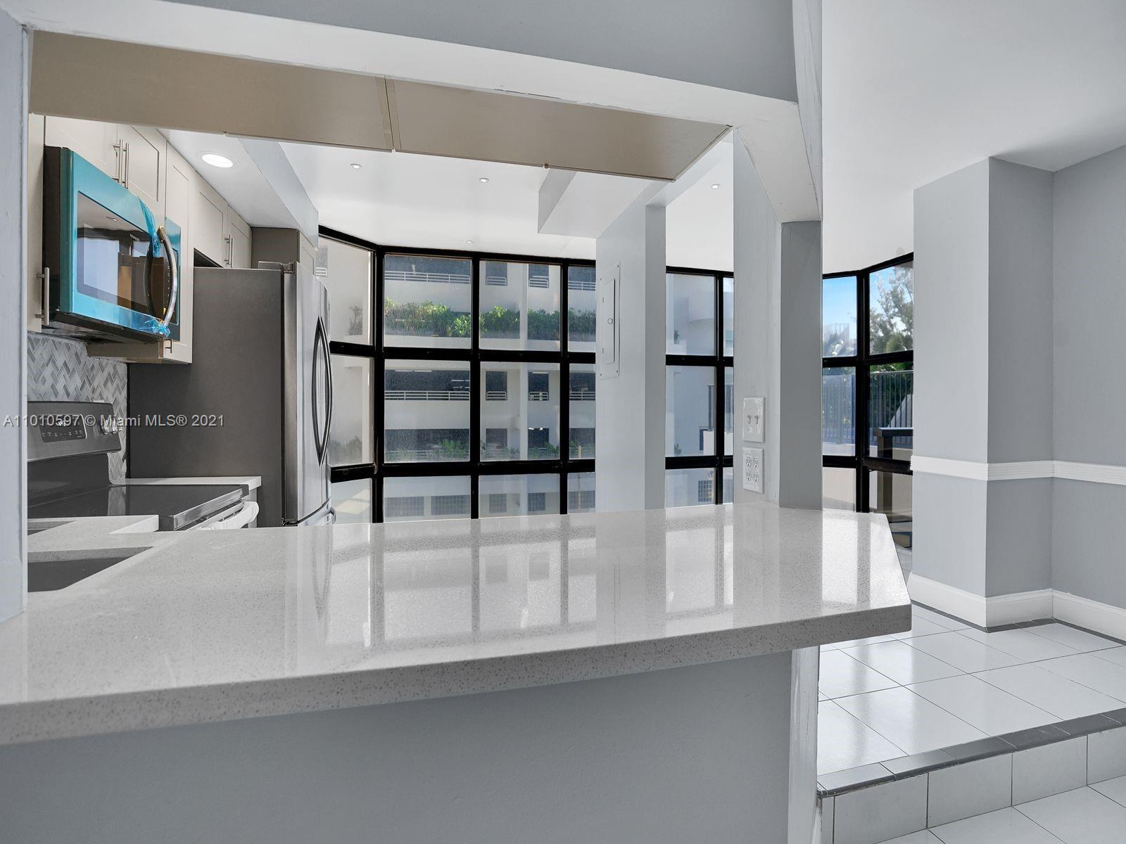 Building Photo - 6423 Collins Ave