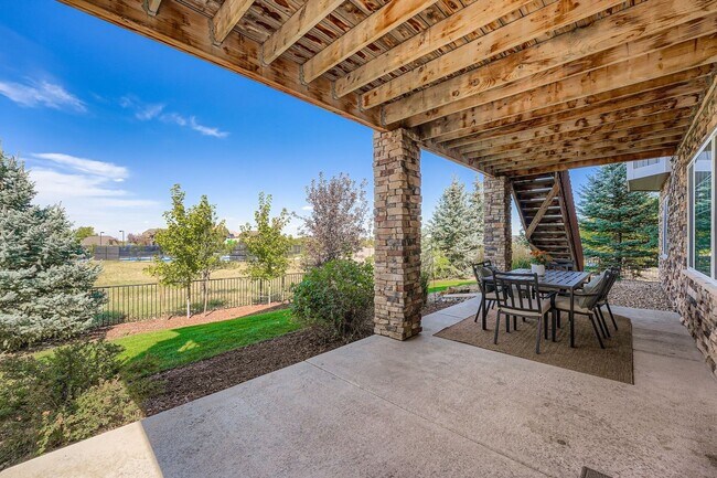 Building Photo - Beautifully maintained 5-bedroom home with a large finished basement, club access, and top-rated ...