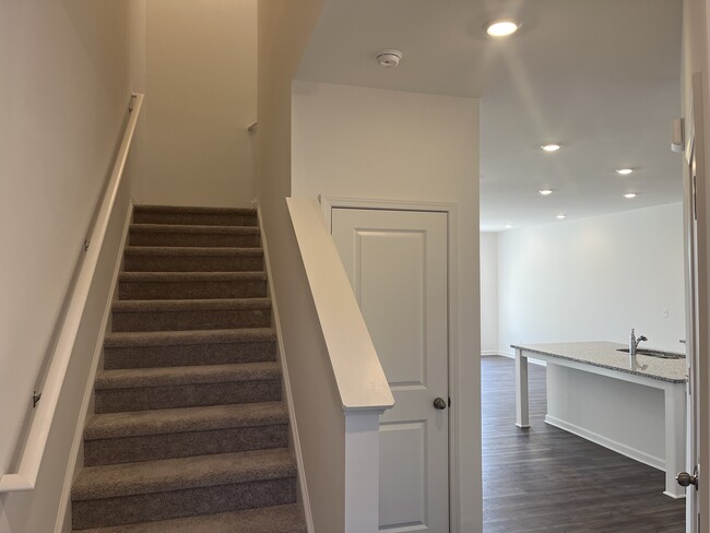 Stairs and coat closet - 170 Mission Blvd