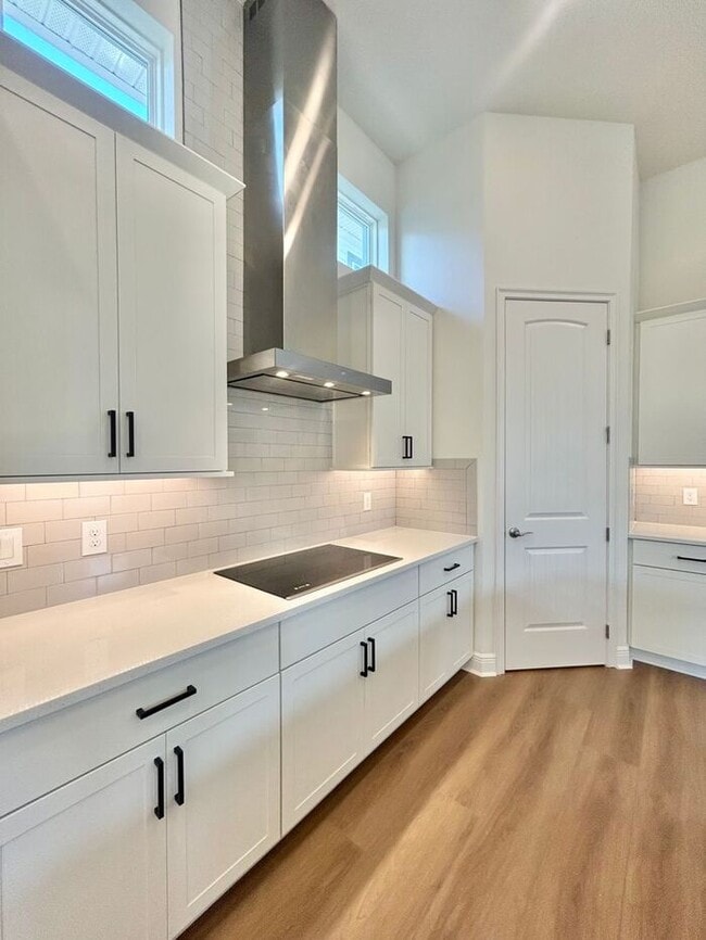 Building Photo - Gorgeous 4/3 Residence with a Private Back Lanai and a 3 Car Garage in the Delightful Laureate Pa...