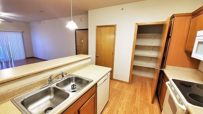 Building Photo - $1,450 | 2 Bedroom, 2 Bathroom Condo | Pets Negotiable | Available for August 1st, 2026 Move In!