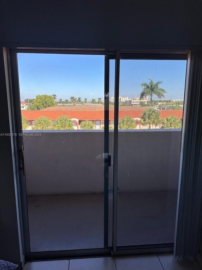 Building Photo - 6091 W 22nd Ct