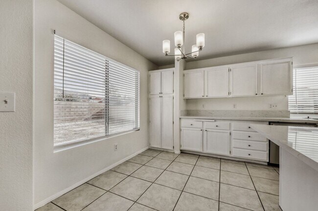 Building Photo - Fully remodeled!  Cozy 4 bedroom with 3 car garage !