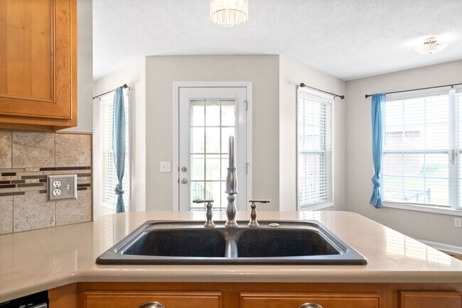 Building Photo - Pet Friendly Three Bedroom with Bonus!