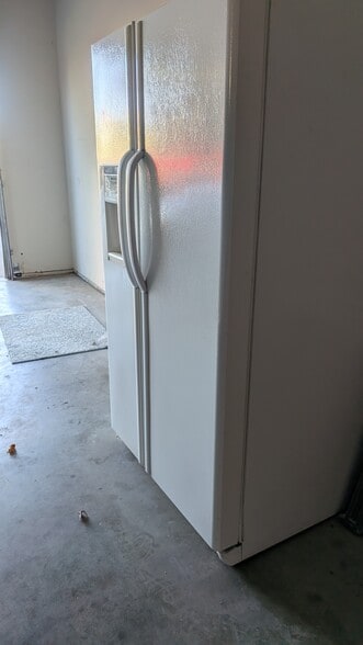 Extra Refrigerator in Garage - 632 S Lawler Ave