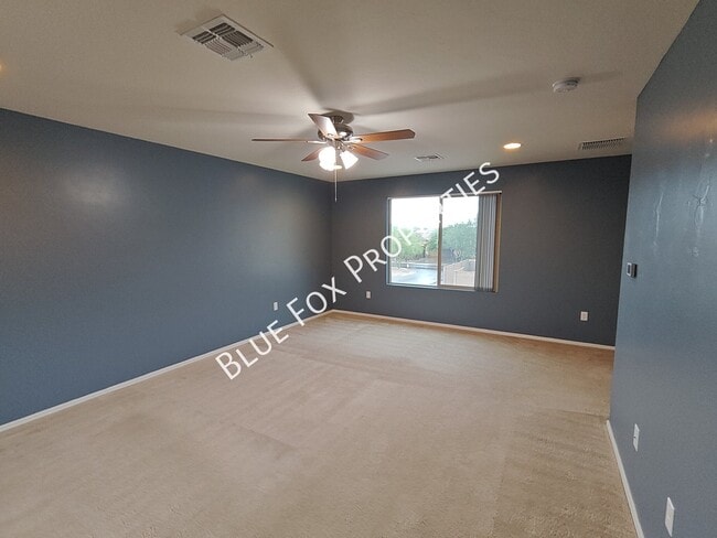 Building Photo - 10947 E Passion Flower Ln
