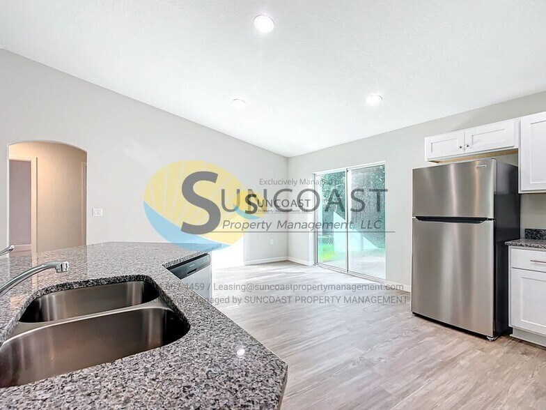 Building Photo - 9473 N Athenia Dr