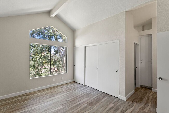 Building Photo - Move-In Special - 50% Off First Month’s Rent! Beautiful End Unit Condo with Overlook of Park and ...