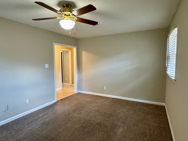 Building Photo - Check Out This 3 Bedroom / 2 Bathroom BRIC...