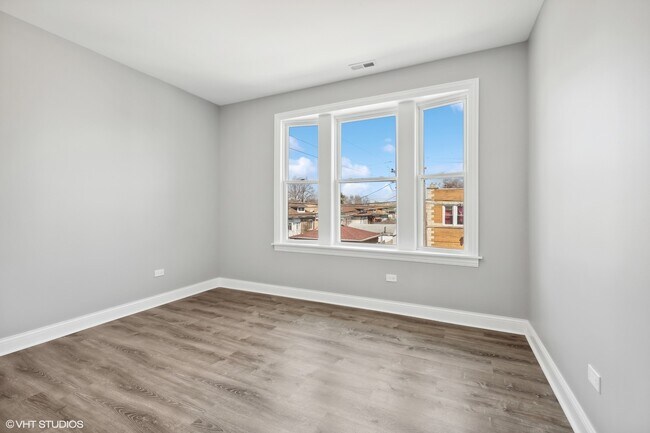 Building Photo - 5939 W 16th St