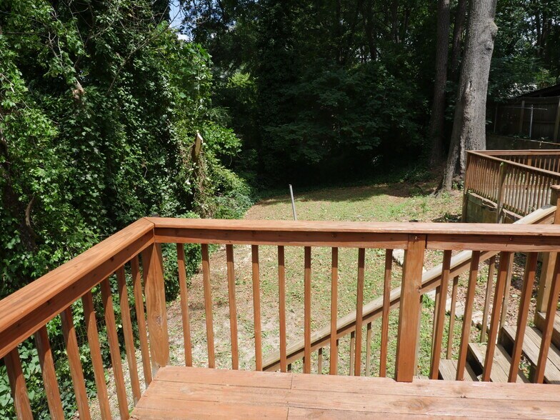 Stained back deck and backyard - 1065 Atlantic Dr NW