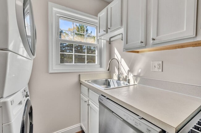 Building Photo - Utilities Included! Updated 2-Bedroom Condo Just Steps from Huntington Metro