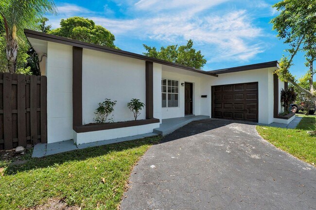 Building Photo - Sunrise Gem: Updated 2-Bed, 2-Bath with Garage Parking