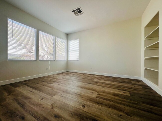 Building Photo - REMODELED, SPACIOUS, 4 BEDROOM HOME WITH VAULTED CEILINGS AND LOFT