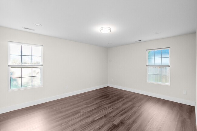 Building Photo - LIVE CLOSE TO THE ACTION — Modern 3-Bedroom Rental in Charlotte’s Reid Park!