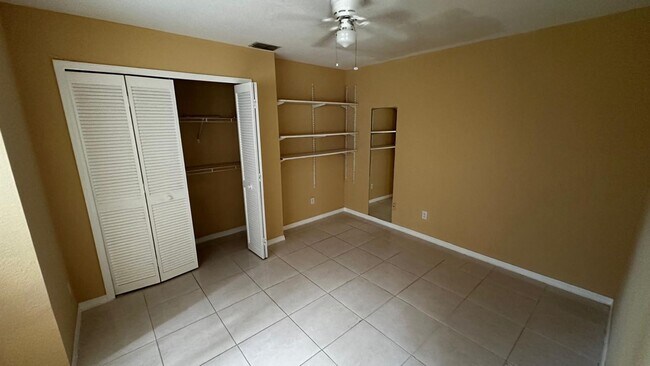 Building Photo - SPACIOUS 4-BEDROOM HOME WITH SCREENED POOL IN SE CAPE CORAL