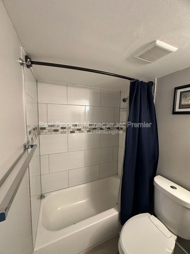 Building Photo - 9491 Palm Cir S