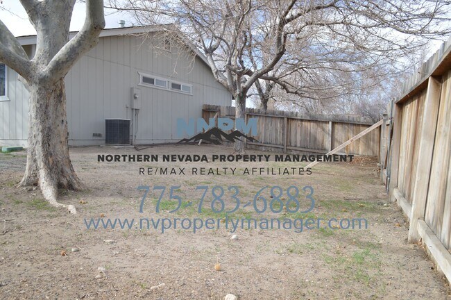 Building Photo - $2200 ~ 4 Bed ~ 2 Bath ~ Large Home on Corner lot off of S McCarren in Donner Springs Neighborhoo...