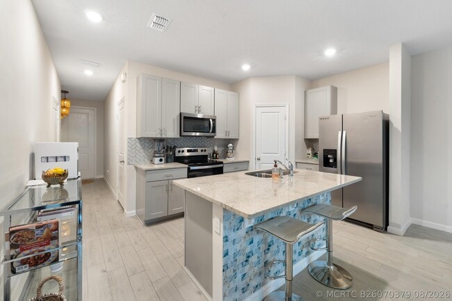 Building Photo - 3936 SE Caladium Ct
