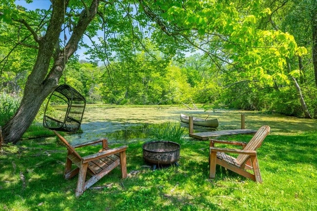 Building Photo - Stunning Updated Home with Private Pond Views in Chappaqua