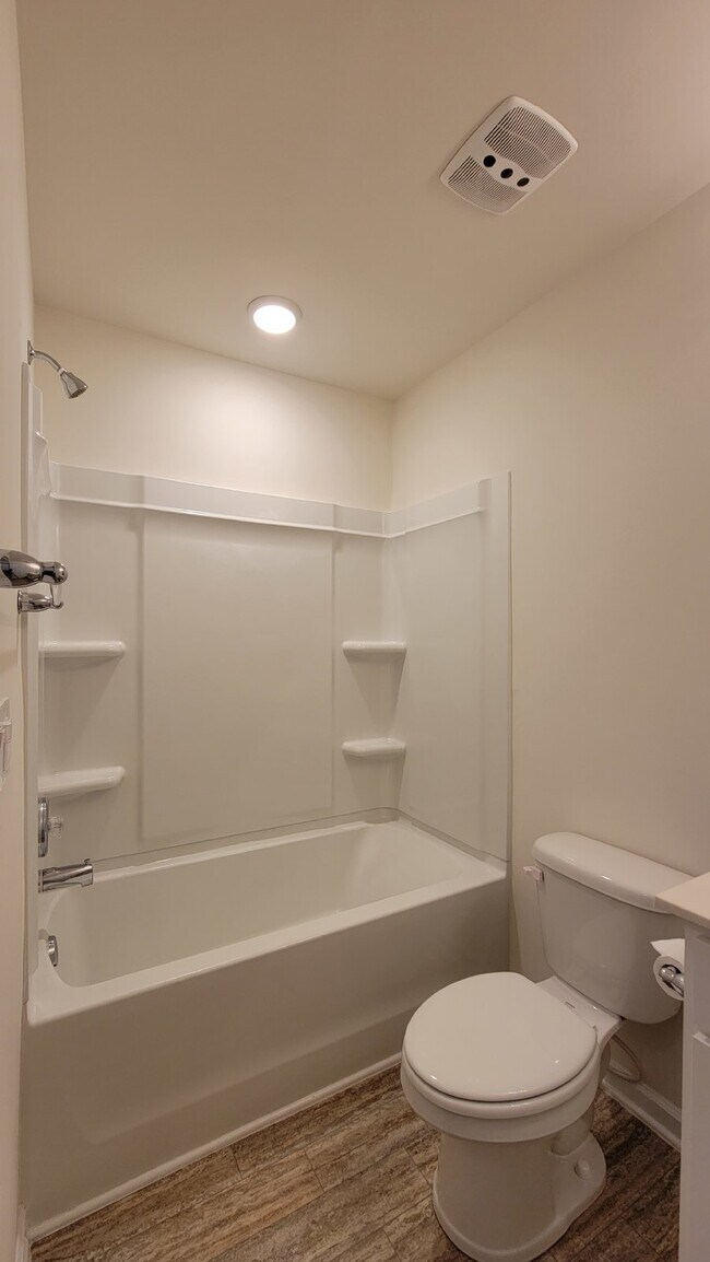 Building Photo - Modern 3-Bedroom Multiplex with 3 Full Bat...