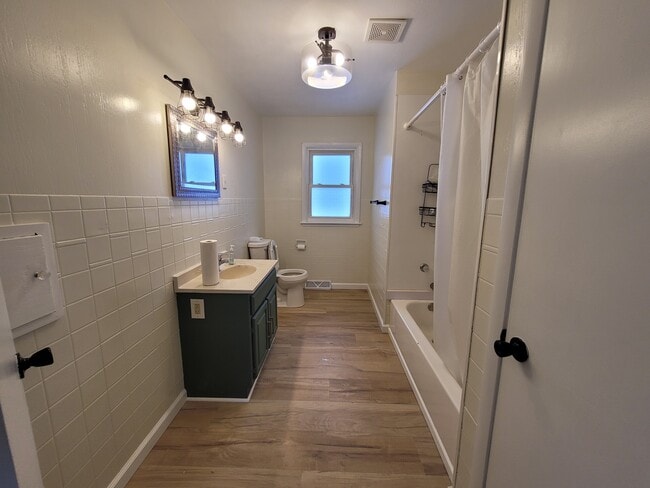 Building Photo - 4998 10th Ave