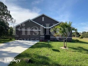 Building Photo - 6938 NW Daffodil Ln