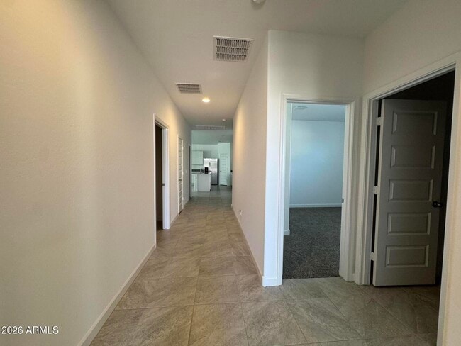 Building Photo - 5835 E Freesia Ln