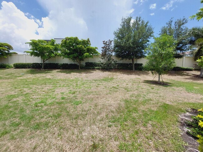 Building Photo - Luxurious Home in Toscana Isles Gated Community