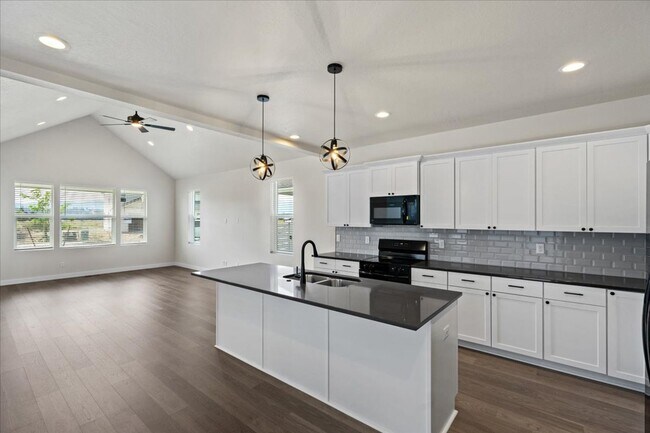 Building Photo - Brand New, Stylish 4-Bedroom Home with Vaulted Ceilings and Private Patio