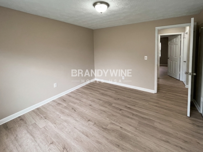 Building Photo - 8409 Red Holly Ln