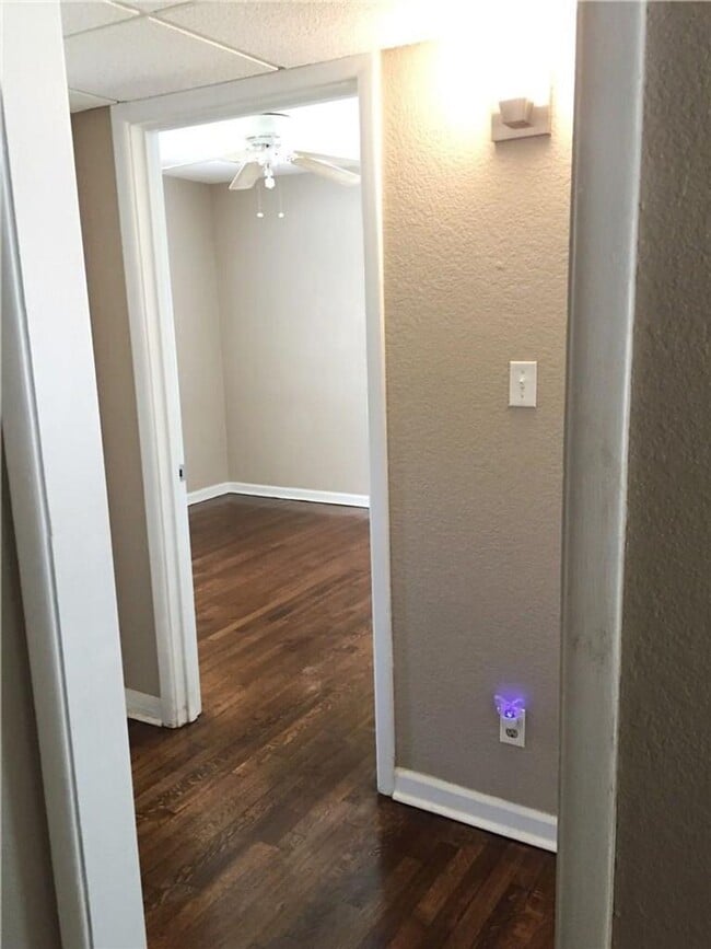 Building Photo - Remodeled 1 story home in Hurst with original plank wood flooring