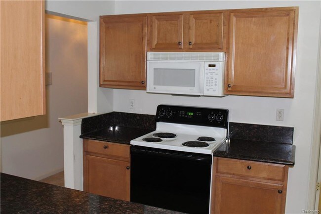 Building Photo - 16695 Carriage Way