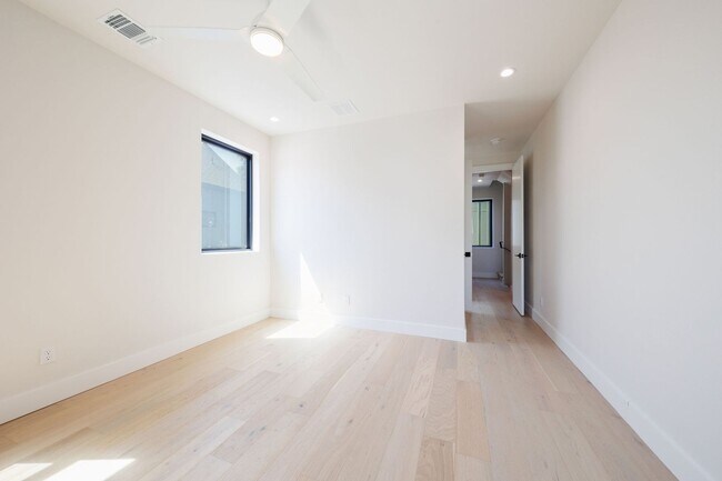 Building Photo - Luxury Redefined: Experience Vibrant Living in this 3-Bedroom Haven in East Austin