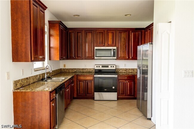 Building Photo - 7029 Ambrosia Ln
