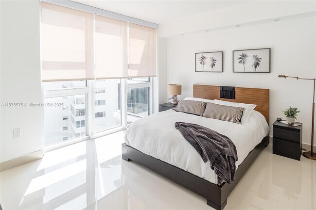 Building Photo - 10275 Collins Ave