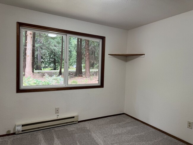 Building Photo - Cozy one story home on beautiful close to town acreage.