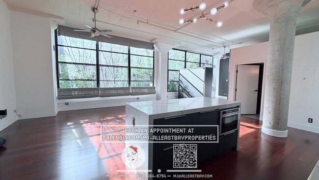 Building Photo - Sunny loft with in unit gym, heated floors in bathroom, contemporary kitchen, and includes water/...