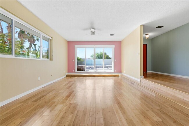Building Photo - 3 bed / 2 Bath Mid-Century Home with Two-Car Garage, Soaking Pool and Manicured Backyard!