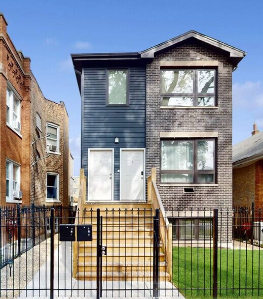Building Photo - 1049 N Lawler Ave