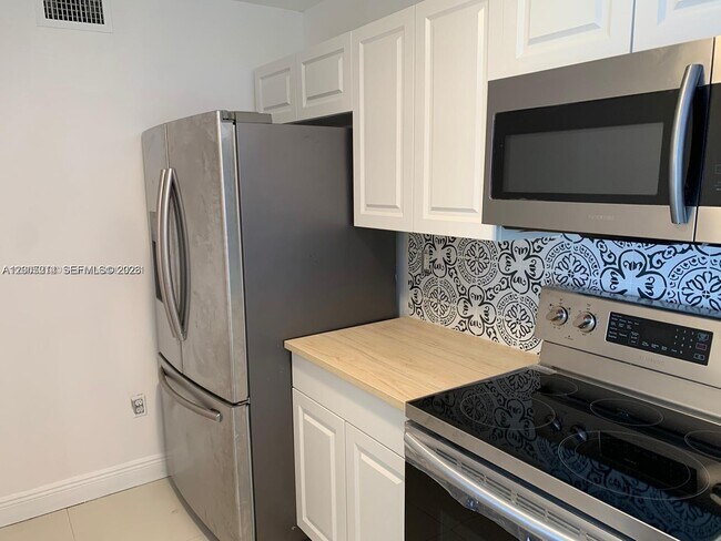 Building Photo - 8590 SW 212th St