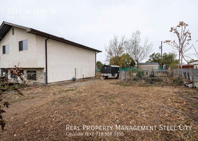 Building Photo - Spacious 5-Bedroom Home with Solar Panels ...