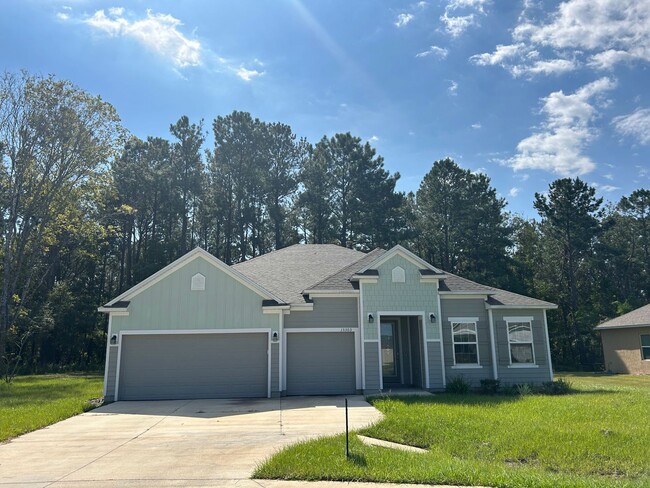 Primary Photo - 4/3 + Bonus Room with 3 Car Garage on 1/2 ...