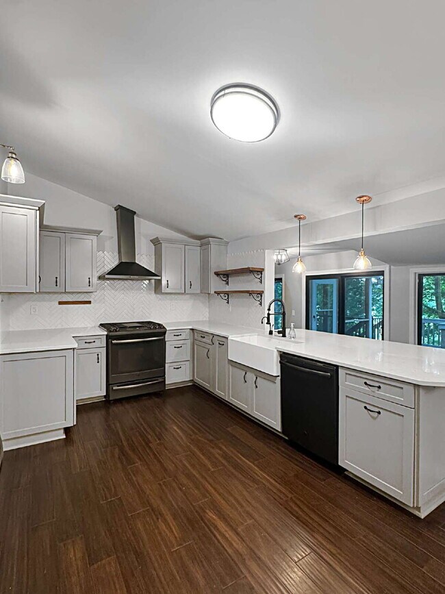 Building Photo - Modern Lake Lanier Retreat | 3BR/3.5BA | Private Swim Dock